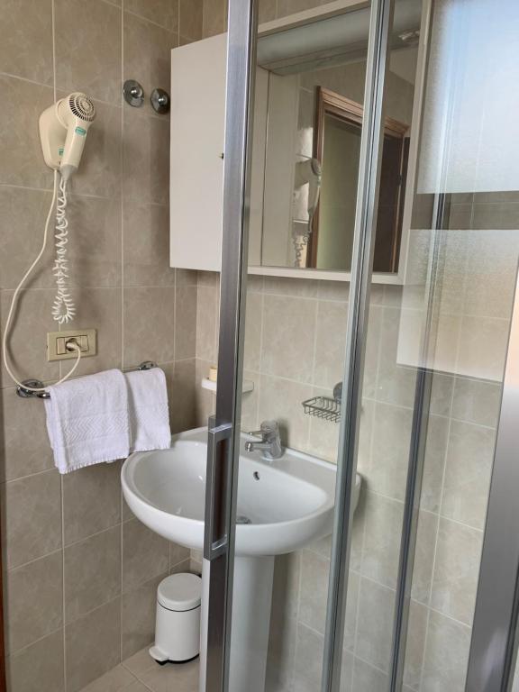Koupelna v ubytování Hotel Al Capitano