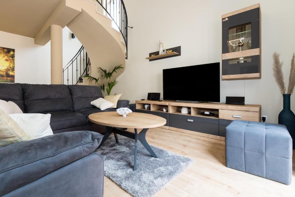 Televízia a/alebo spoločenská miestnosť v ubytovaní Vitality Villa Mariante - free kajaks, sauna