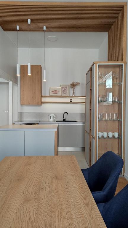 Kuchyň nebo kuchyňský kout v ubytování Apartamenty Ceglane