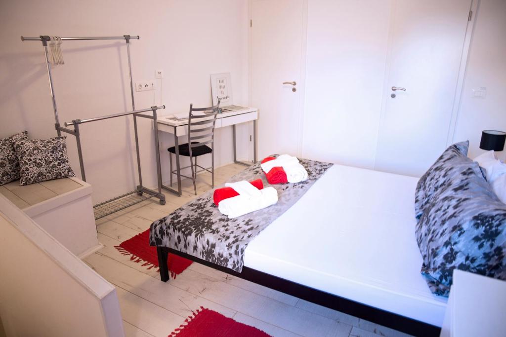 Posteľ alebo postele v izbe v ubytovaní Old Town centar, cozy and quiet modern apartment