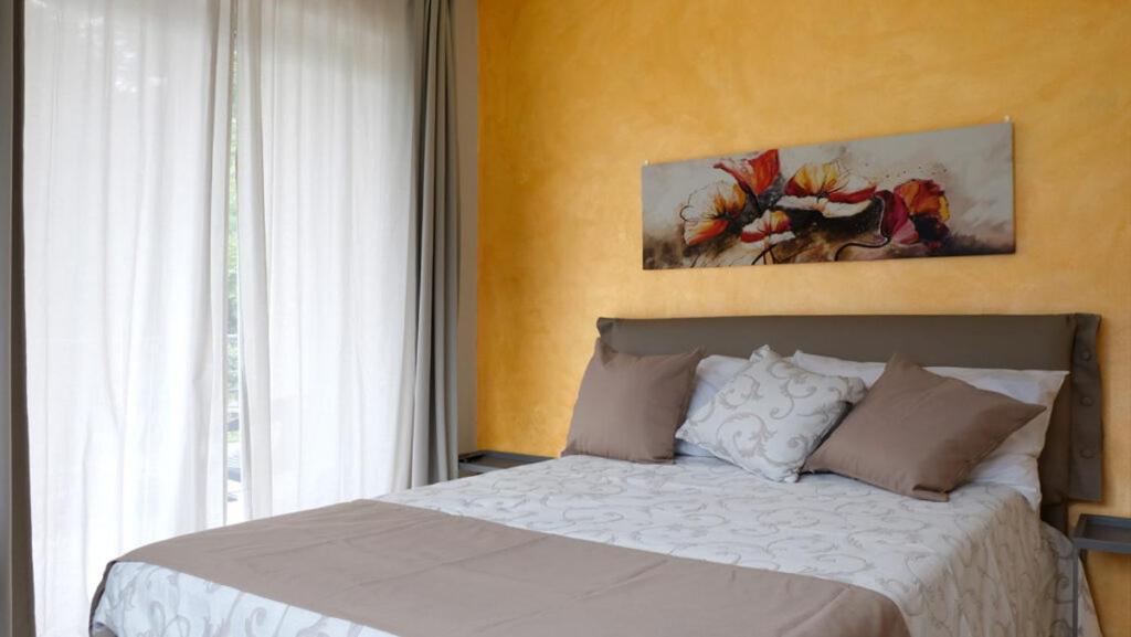 Posteľ alebo postele v izbe v ubytovaní In Collina B&B