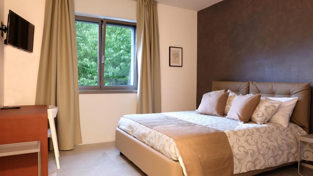 Posteľ alebo postele v izbe v ubytovaní In Collina B&B