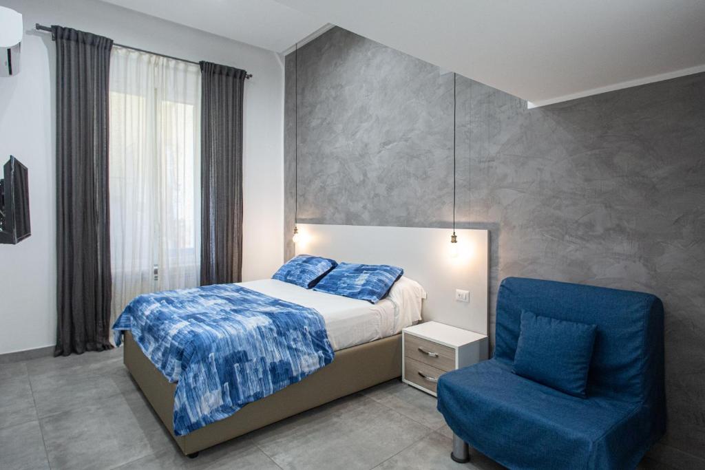 A bed or beds in a room at Casa Nora Napoli