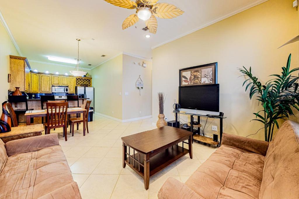 a living room with a couch and a table at Escape Condominiums #7 in South Padre Island