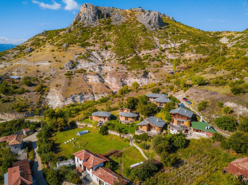 an aerial view of a house on a mountain at Eco Village Under the Cliffs in Ilindentsi