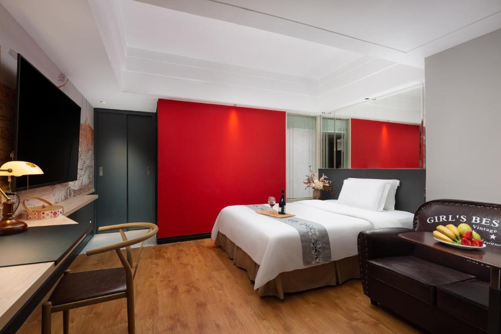 Ένα ή περισσότερα κρεβάτια σε δωμάτιο στο President Hotel
