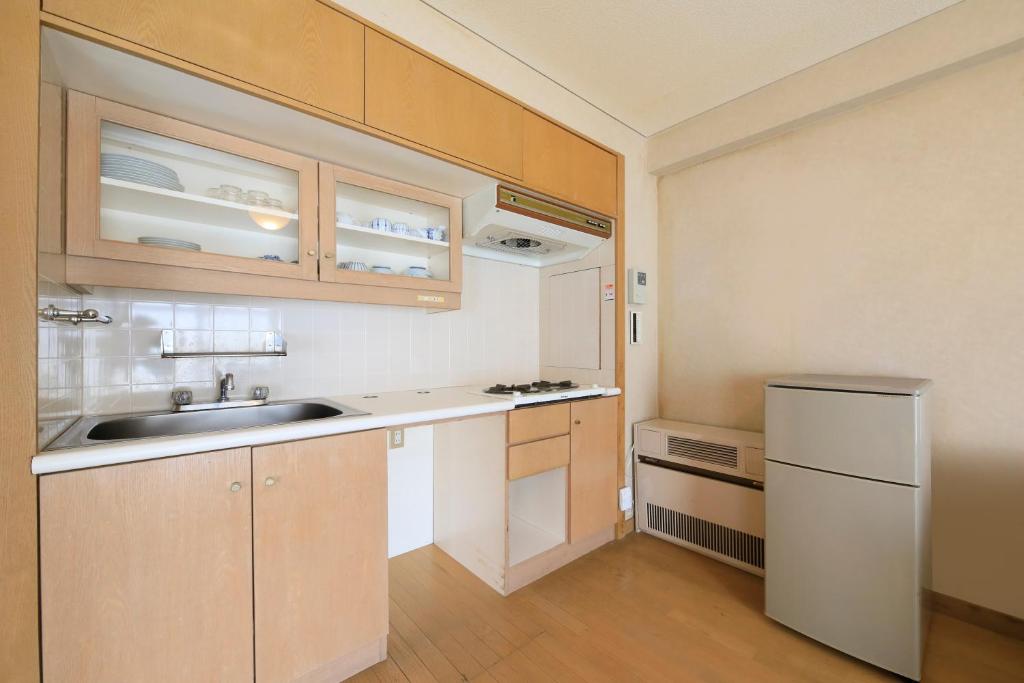 Kuchyň nebo kuchyňský kout v ubytování Kishutetsudo Karuizawa Hotel