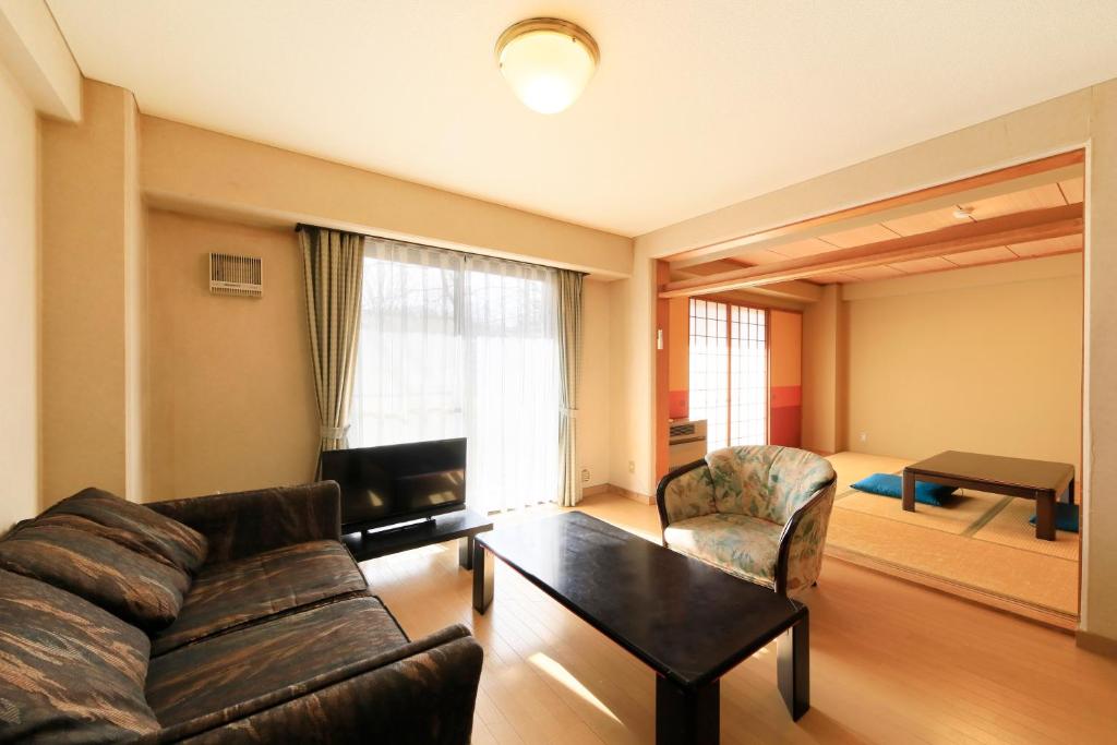 Posezení v ubytování Kishutetsudo Karuizawa Hotel