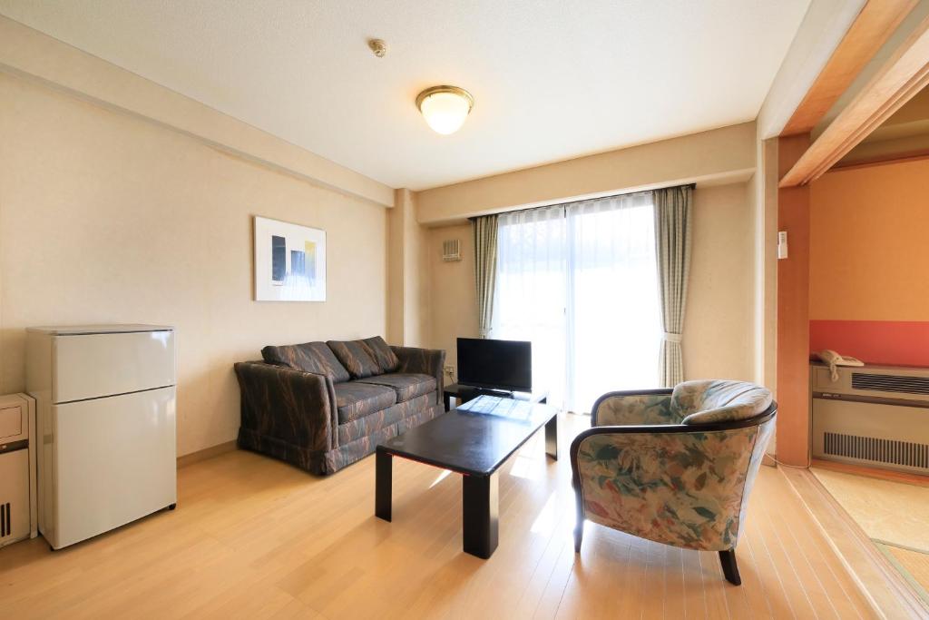 Posezení v ubytování Kishutetsudo Karuizawa Hotel