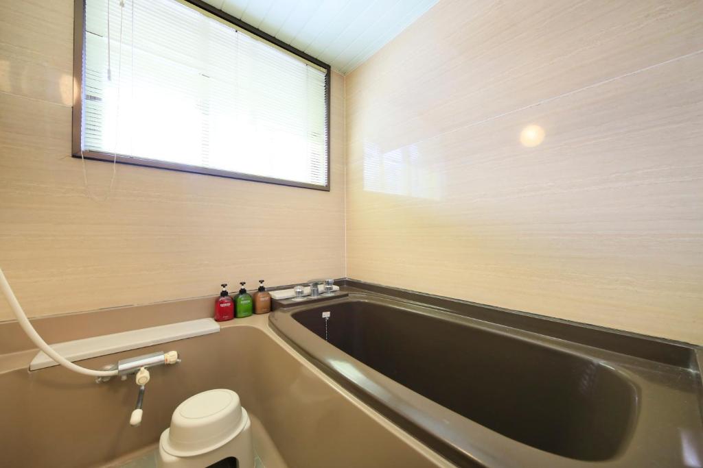 Koupelna v ubytování Kishutetsudo Karuizawa Hotel