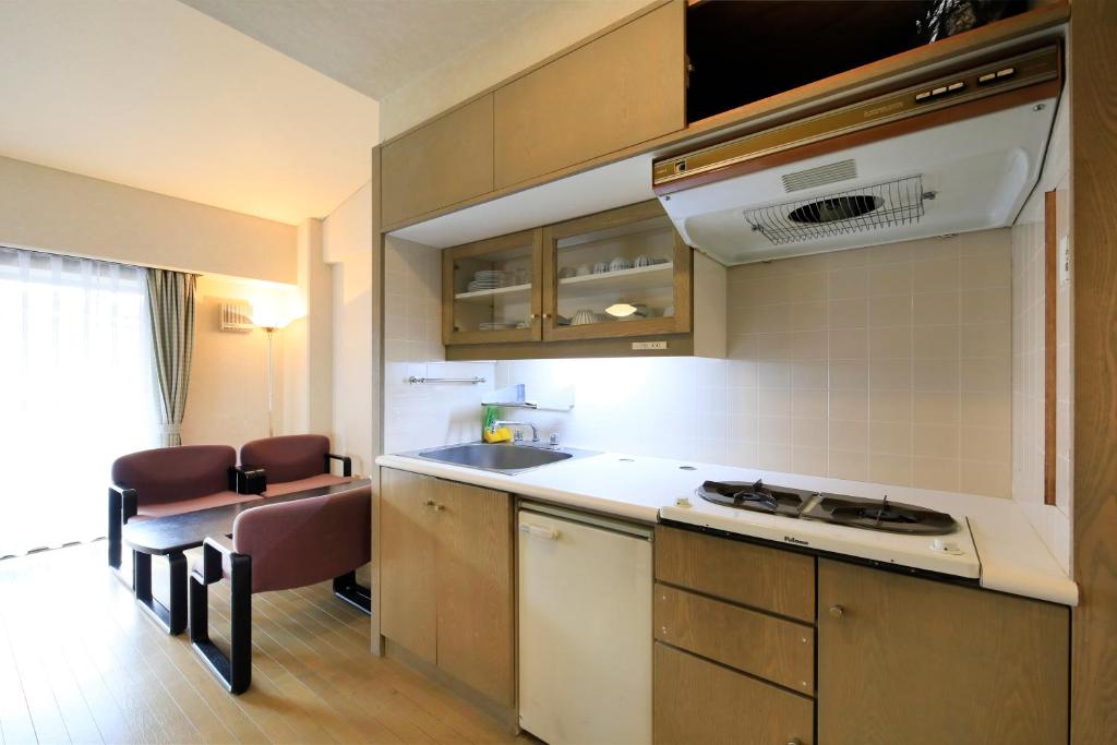 Kuchyň nebo kuchyňský kout v ubytování Kishutetsudo Karuizawa Hotel