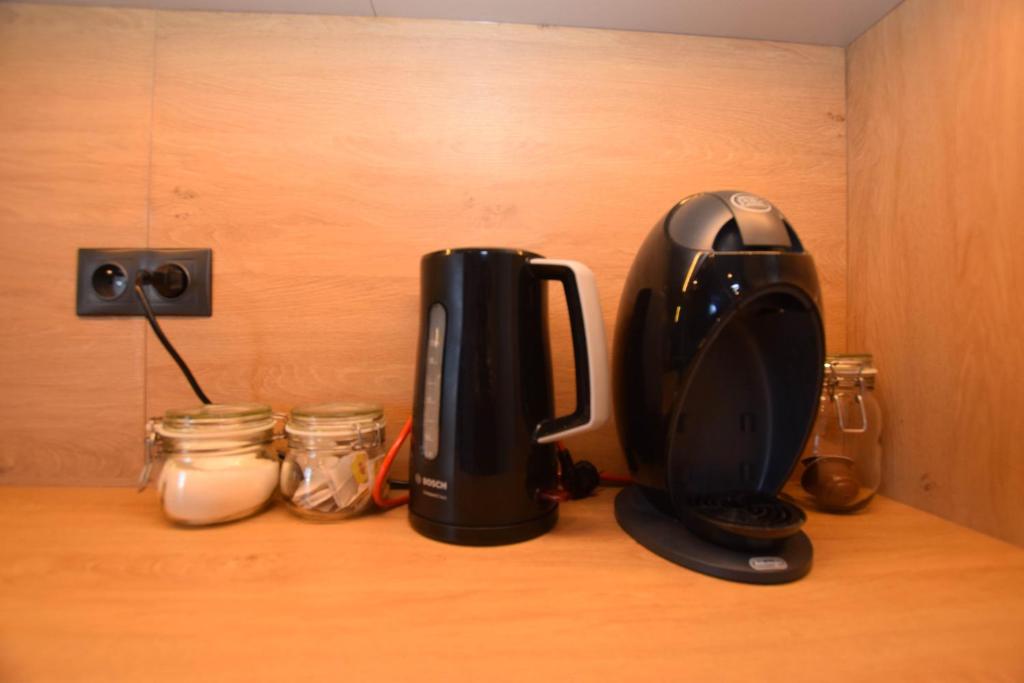 Príslušenstvo na prípravu kávy alebo čaju v ubytovaní Apartamenty nad Wisłą