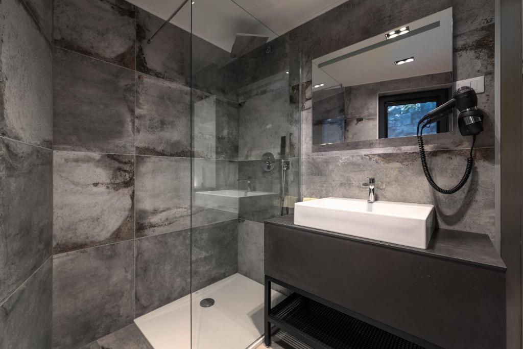 Koupelna v ubytování Hotel Cittar