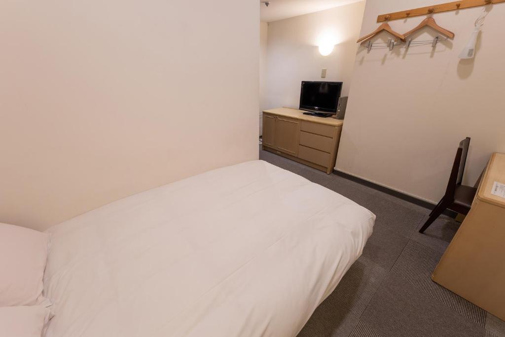 TV a/nebo společenská místnost v ubytování Hotel Kansai