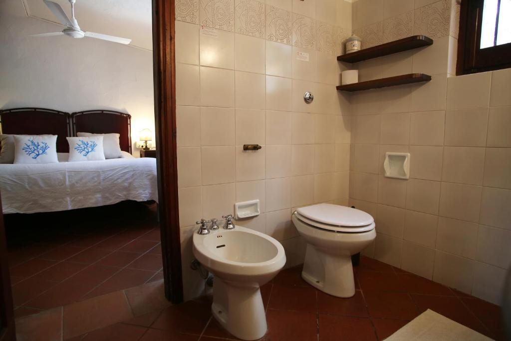 Kúpeľňa v ubytovaní Villa con discesa privata a mare