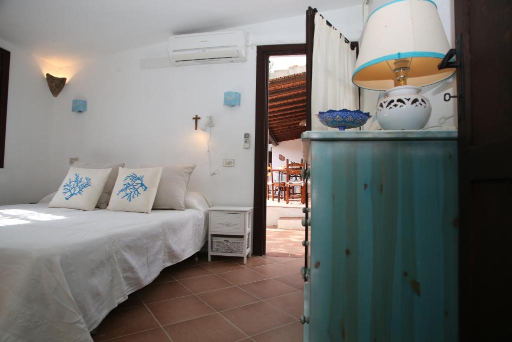 Posteľ alebo postele v izbe v ubytovaní Villa con discesa privata a mare