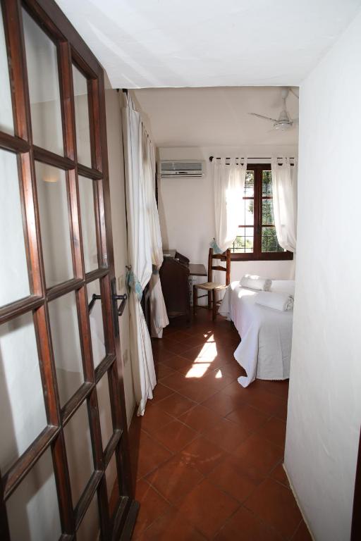 Posteľ alebo postele v izbe v ubytovaní Villa con discesa privata a mare
