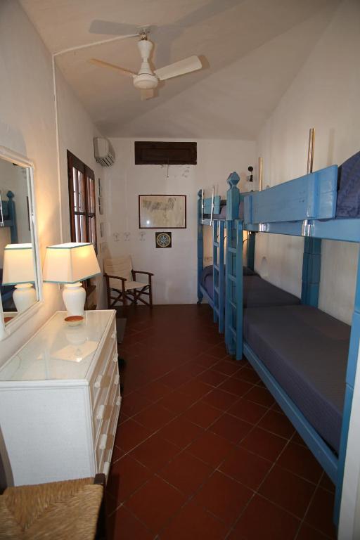 Posteľ alebo postele v izbe v ubytovaní Villa con discesa privata a mare