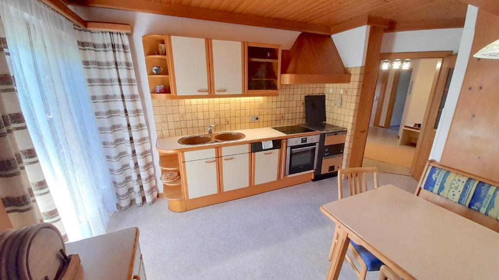 Kuchyň nebo kuchyňský kout v ubytování Guesthouse Schoba Typ D