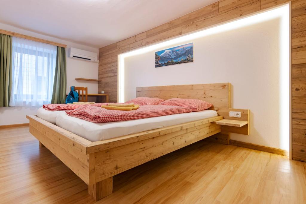 Posteľ alebo postele v izbe v ubytovaní Camping & Pension Au an der Donau