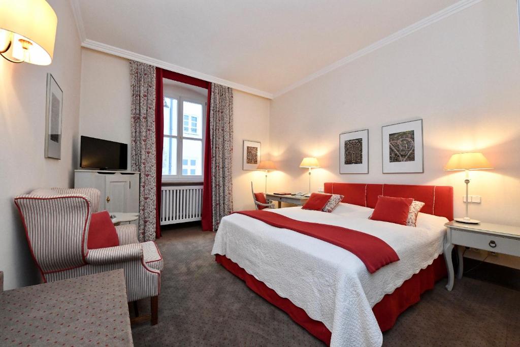 Postel nebo postele na pokoji v ubytování Hotel Bischofshof am Dom
