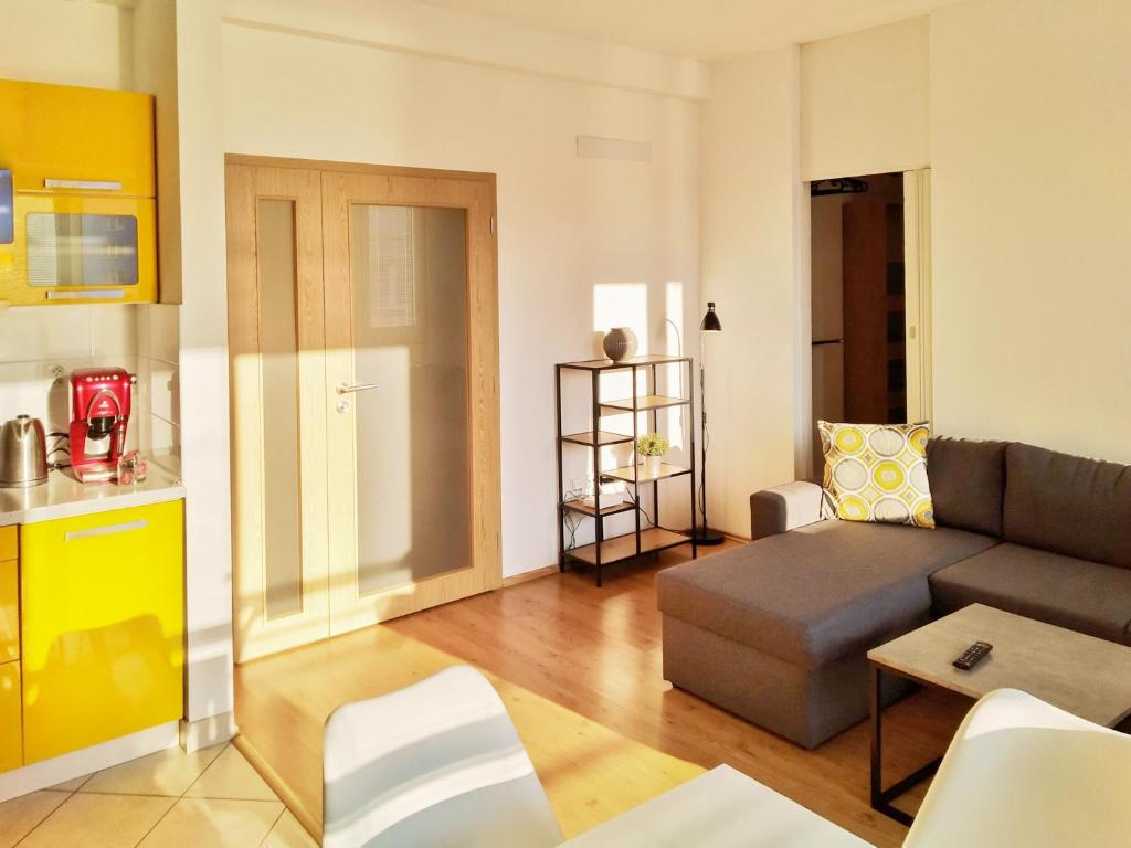 Posezení v ubytování Yellow Apartment