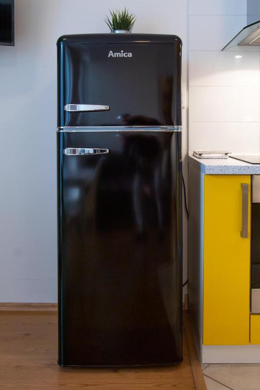 Kuchyň nebo kuchyňský kout v ubytování Yellow Apartment