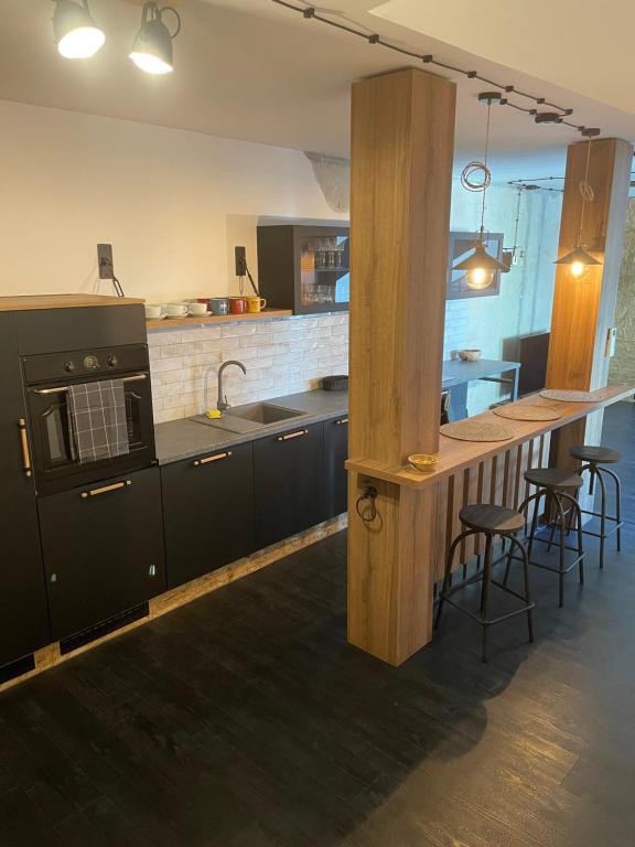 Kuchyň nebo kuchyňský kout v ubytování KAVart apartments