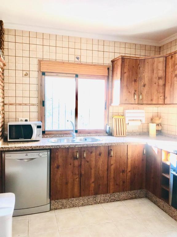 Kuchyň nebo kuchyňský kout v ubytování Casa África