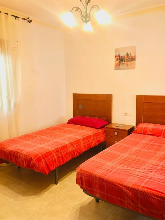 Postel nebo postele na pokoji v ubytování Casa África