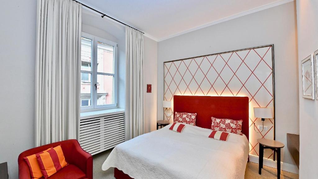 Postel nebo postele na pokoji v ubytování Hotel Bischofshof am Dom