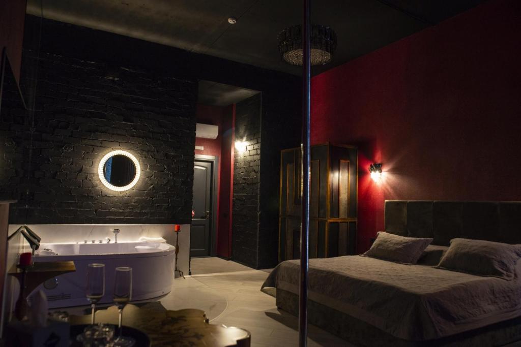 Postel nebo postele na pokoji v ubytování Hotel Nika 2