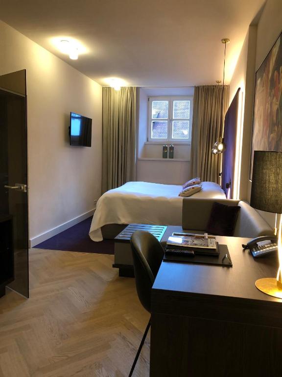 Postel nebo postele na pokoji v ubytování Hotel Bischofshof am Dom