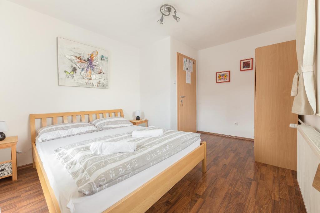Postel nebo postele na pokoji v ubytování Hostel Mama Minka