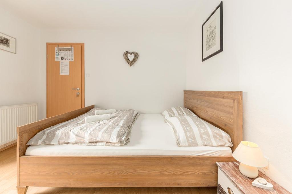 Postel nebo postele na pokoji v ubytování Hostel Mama Minka