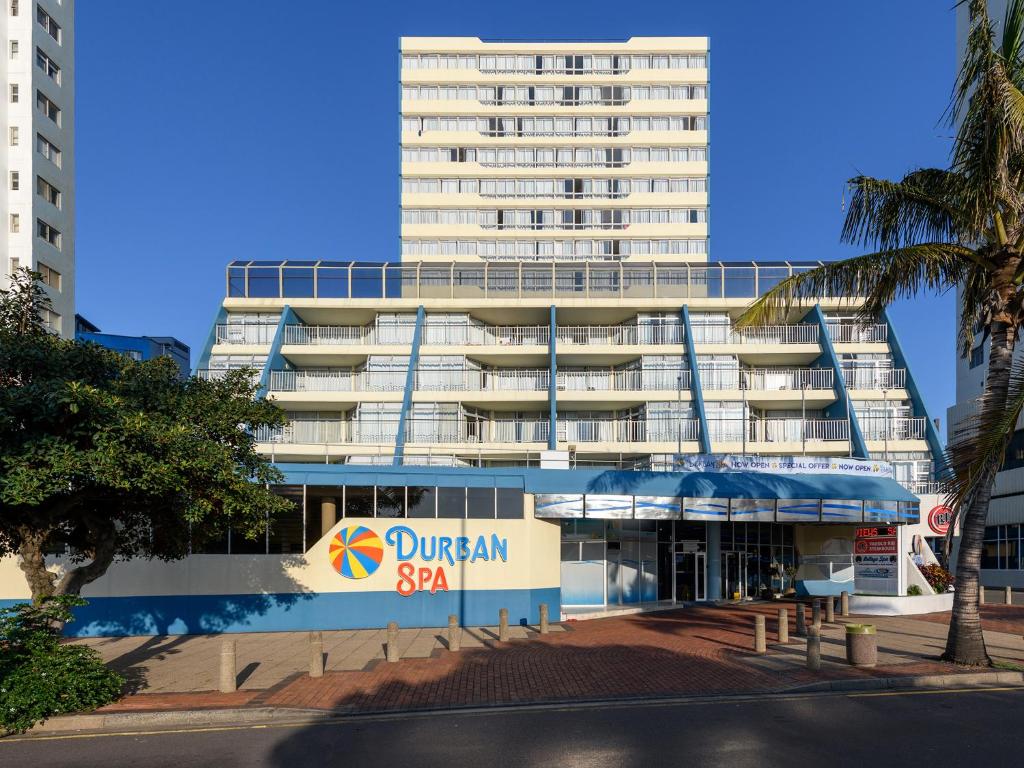 a building with a sign in front of it at Durban Spa in Durban