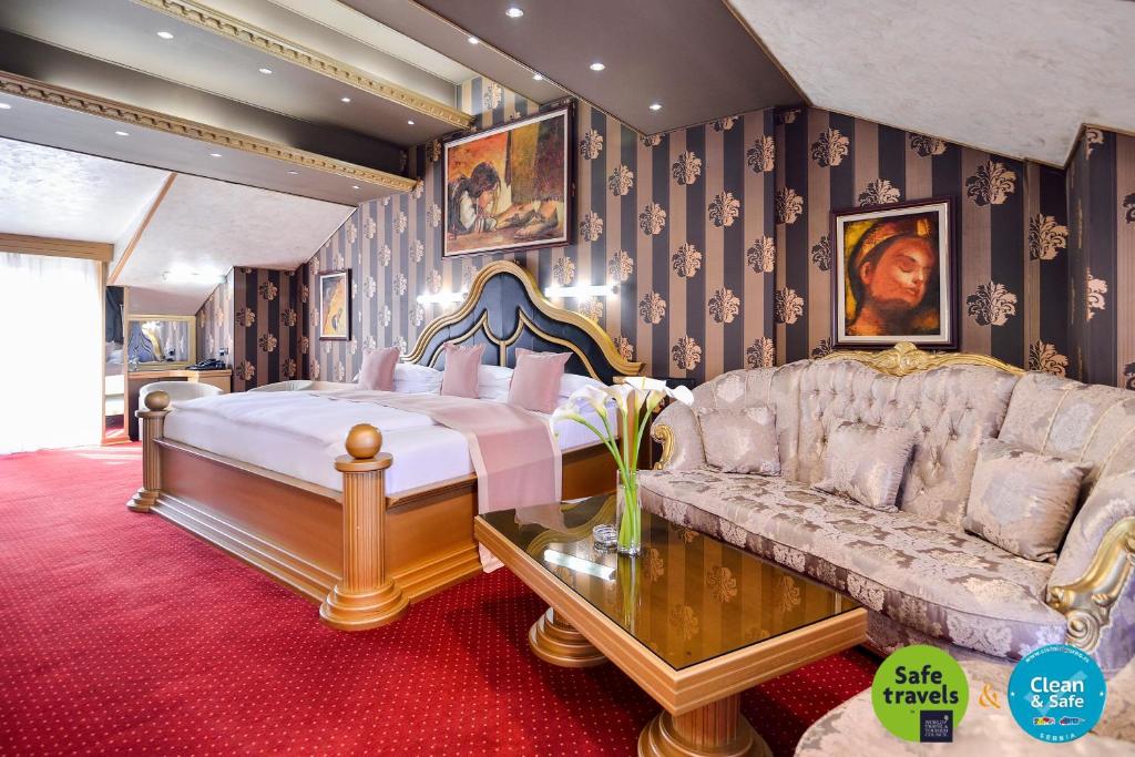 Letto o letti in una camera di Prezident Hotel