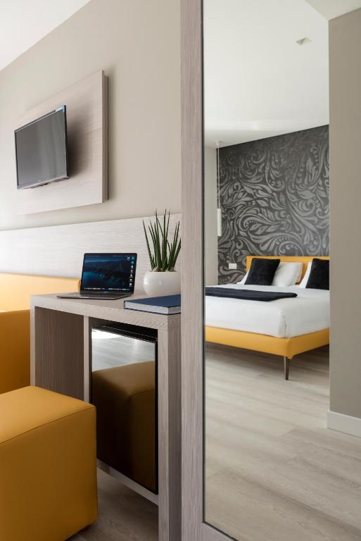 TV a/nebo společenská místnost v ubytování Hotel Delle Rose