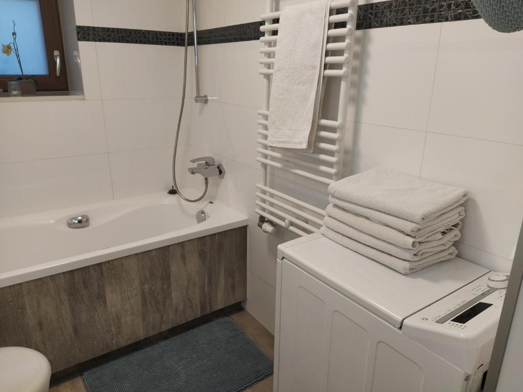 Kúpeľňa v ubytovaní Apartament z tarasem