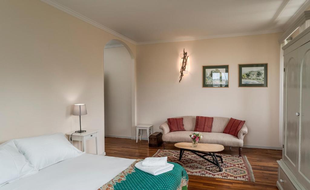 Postel nebo postele na pokoji v ubytování Villa Kefalomandouko