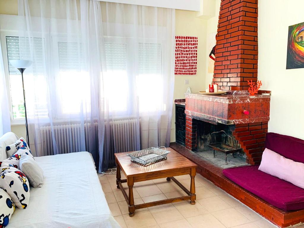 A seating area at Anna's 3 Rooms Apartment Nei Epivates Beach