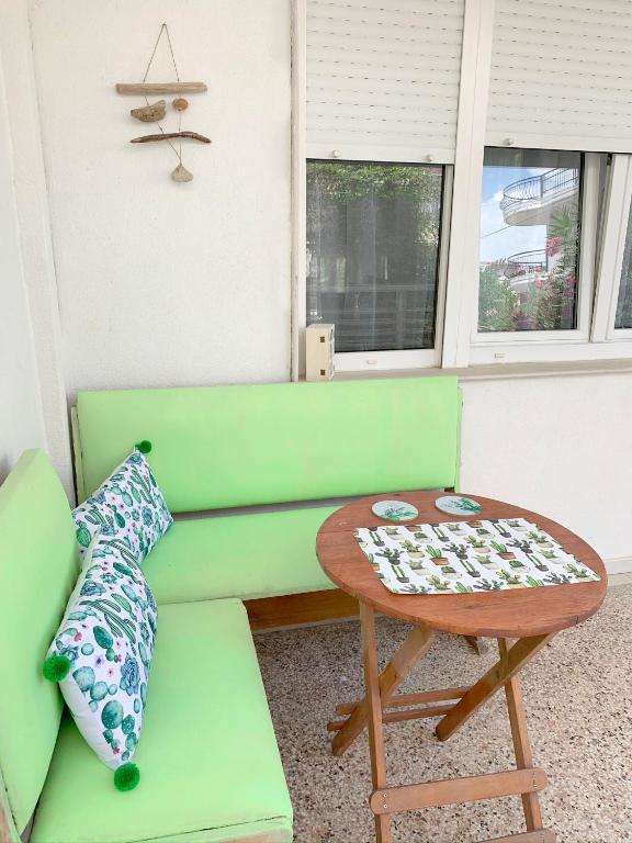A seating area at Anna's 3 Rooms Apartment Nei Epivates Beach