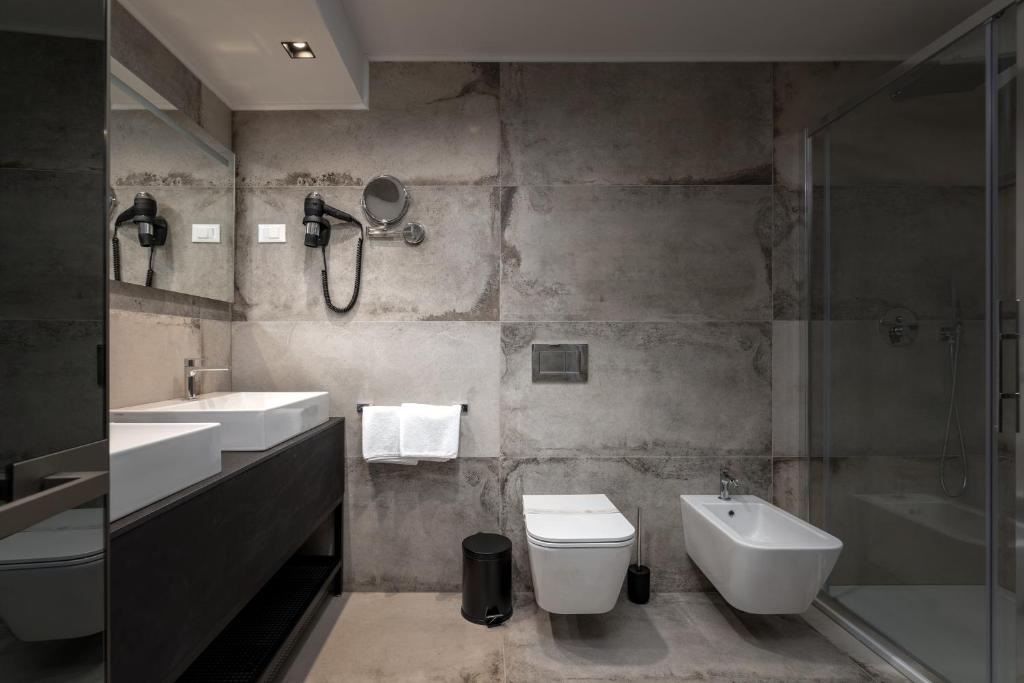 Koupelna v ubytování Hotel Cittar