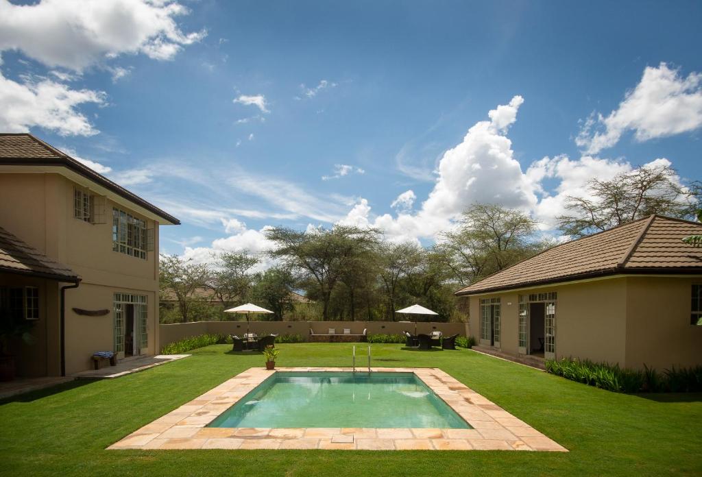 The swimming pool at or close to The Safari House