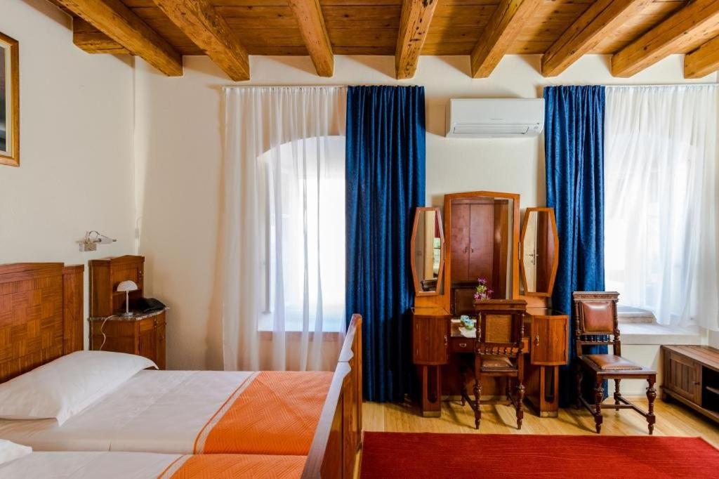 Postel nebo postele na pokoji v ubytování Rooms Miron - Adults Only