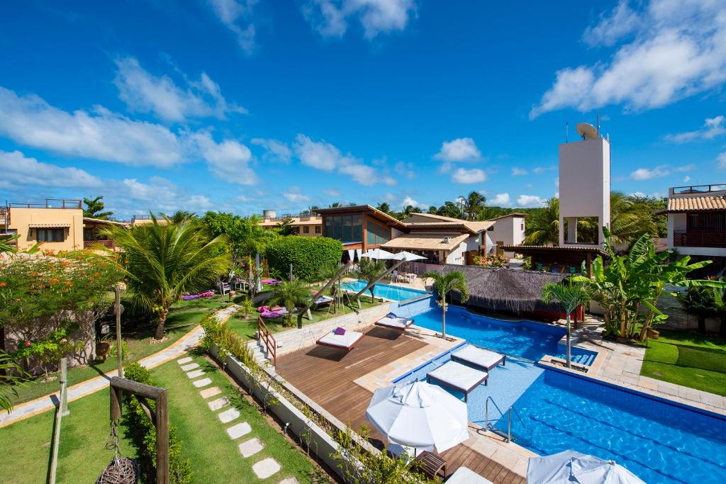 an aerial view of the pool at a resort at Pipa Beleza Spa Resort in Pipa