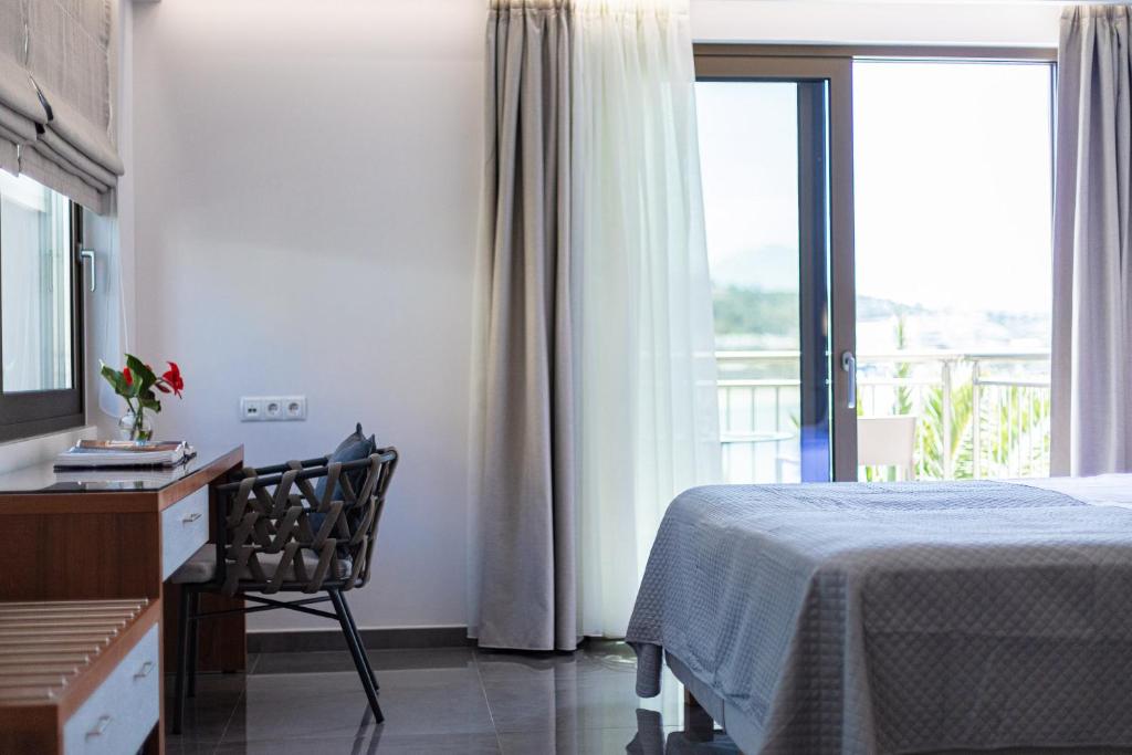 A bed or beds in a room at Sea View Suite "Hara" - Adults Only