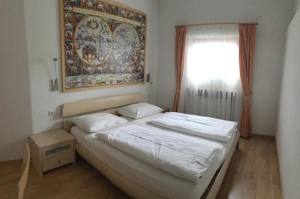 Posteľ alebo postele v izbe v ubytovaní Saskia Residence