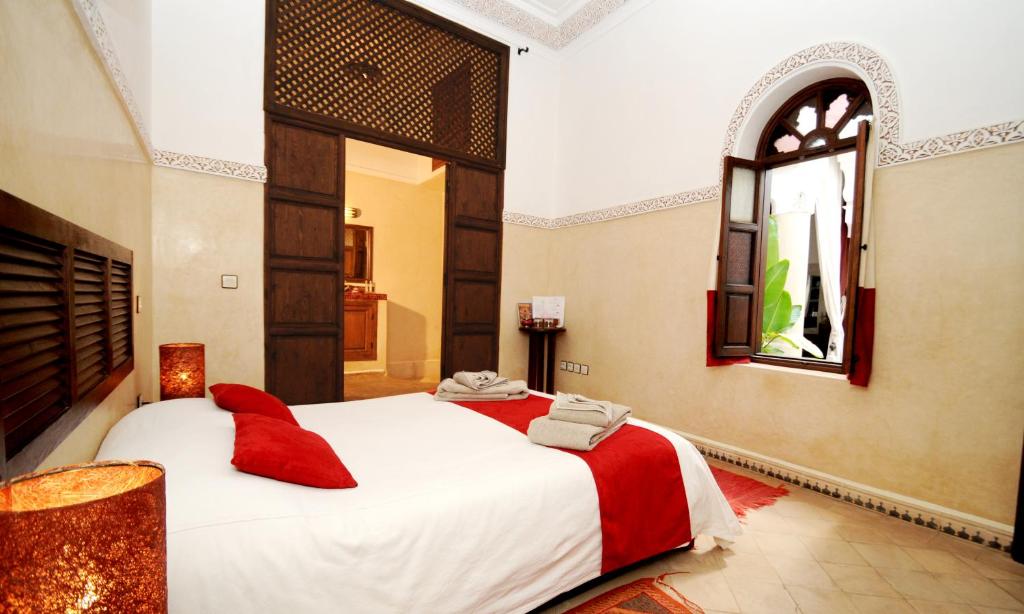 Postel nebo postele na pokoji v ubytování Riad Elias & Spa