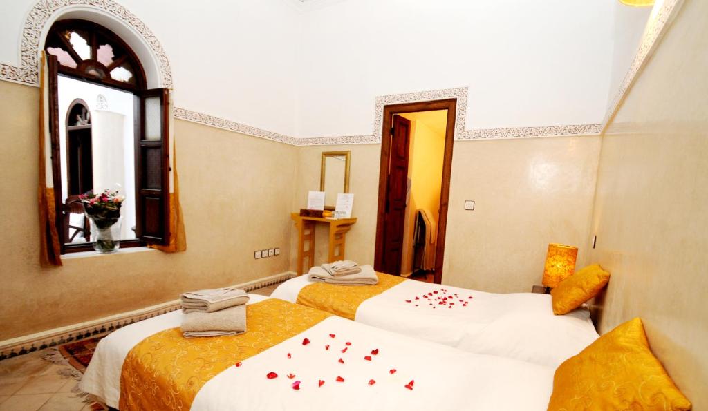 Postel nebo postele na pokoji v ubytování Riad Elias & Spa